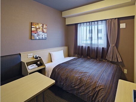 ホテルルートイン富山インターの客室の写真