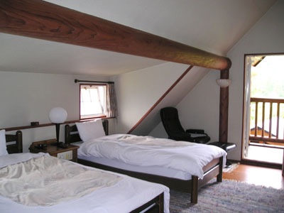 一戸建ログハウスのリゾートホテル　チロリン村の客室の写真