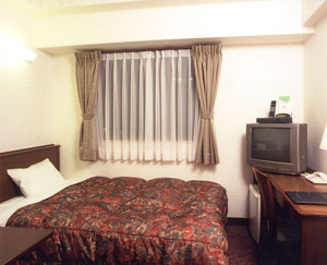萃豊閣ホテル（ＳＵＩＨＯＫＡＫＵ　ＨＯＴＥＬ）の客室の写真