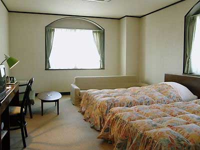 朝の目覚めに心地よい、パンの薫る宿　全館禁煙　プチホテル　クランベールの客室の写真