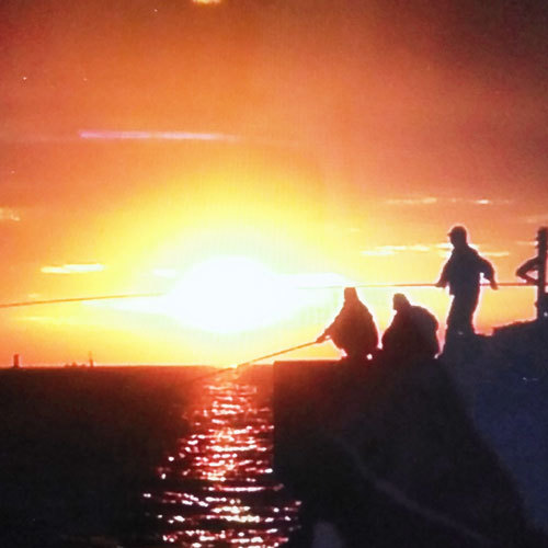 お客様から頂いた日間賀島の夕日（＊素敵な画像のご提供ありがとうございます。）
