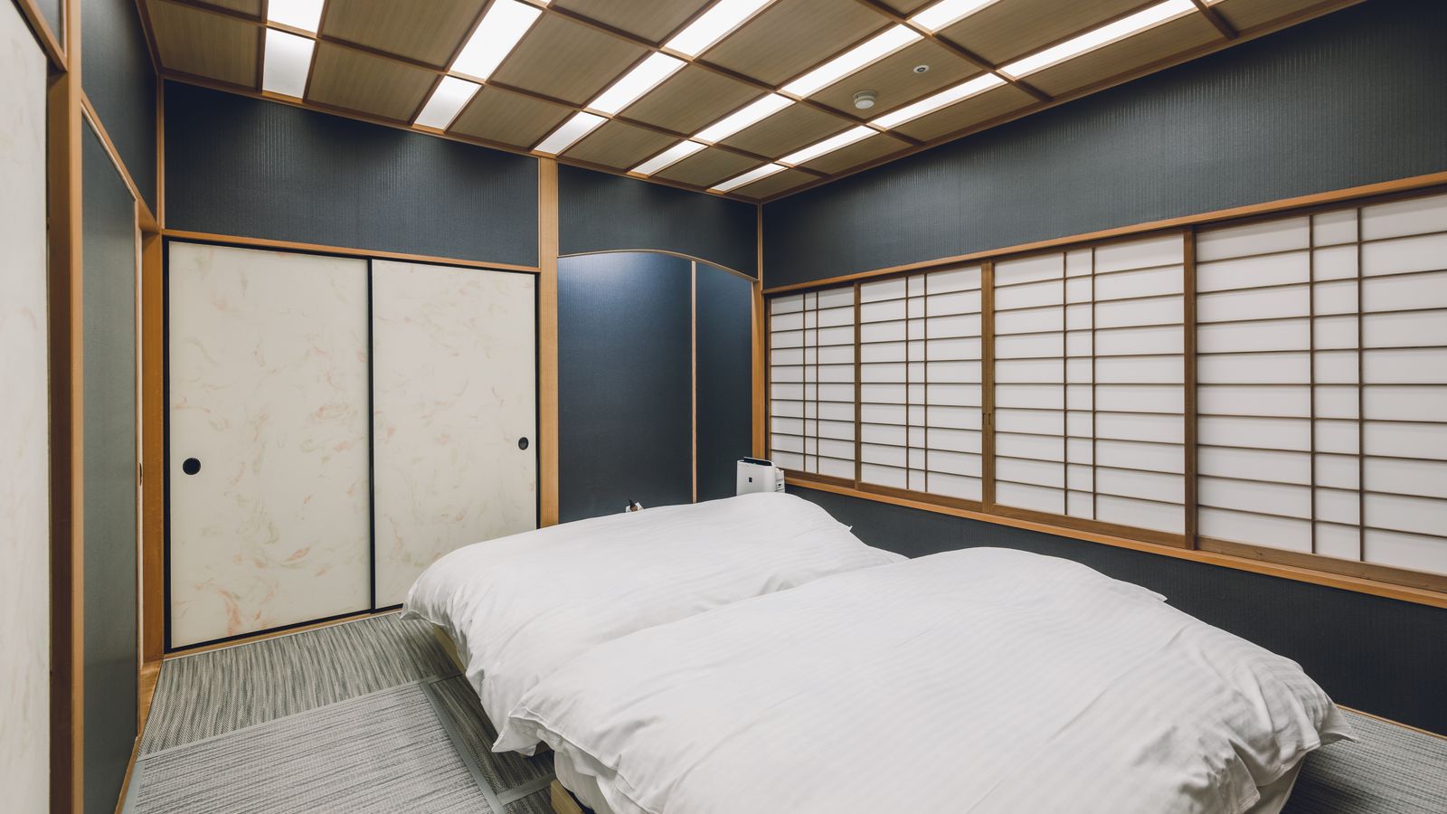 露天風呂付客室「出雲-IZUMO-」本間に隣接する寝室