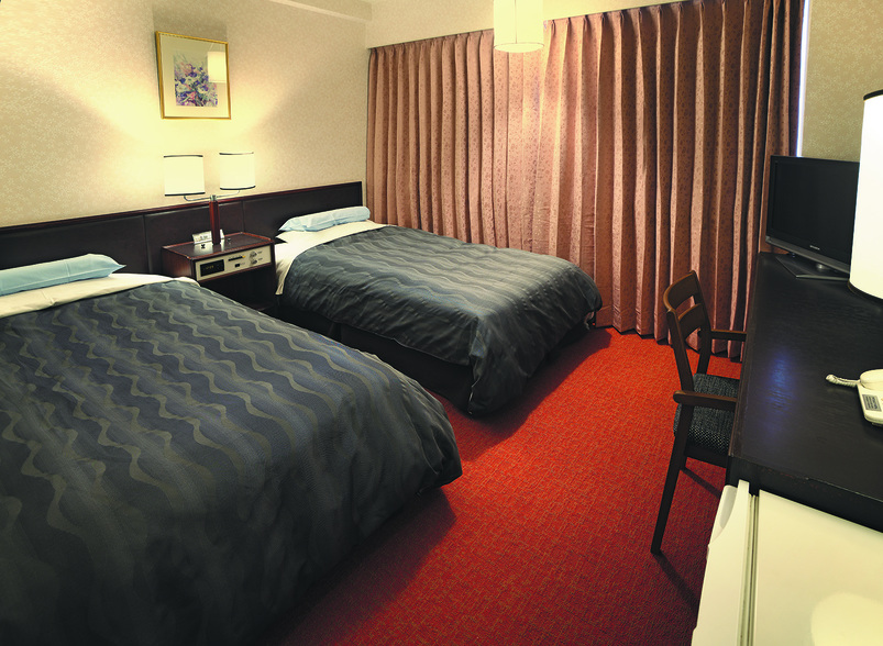 スタンダードツイン19平米ベッドサイズ113cm×;195cm万代シティ側の眺望