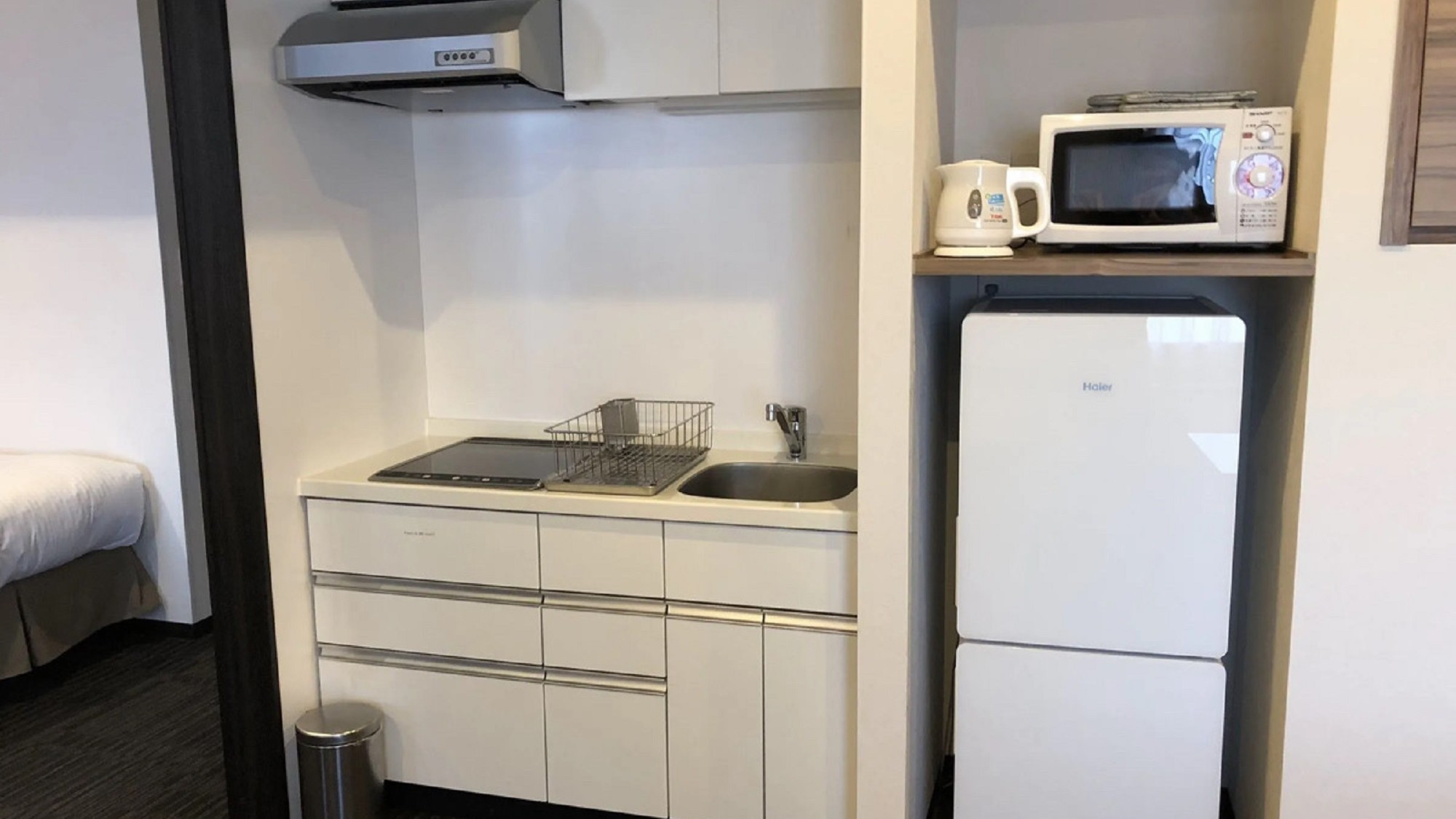 ジュニアスイートプライム｜キッチン、電子レンジ、冷蔵庫、洗濯機を完備。