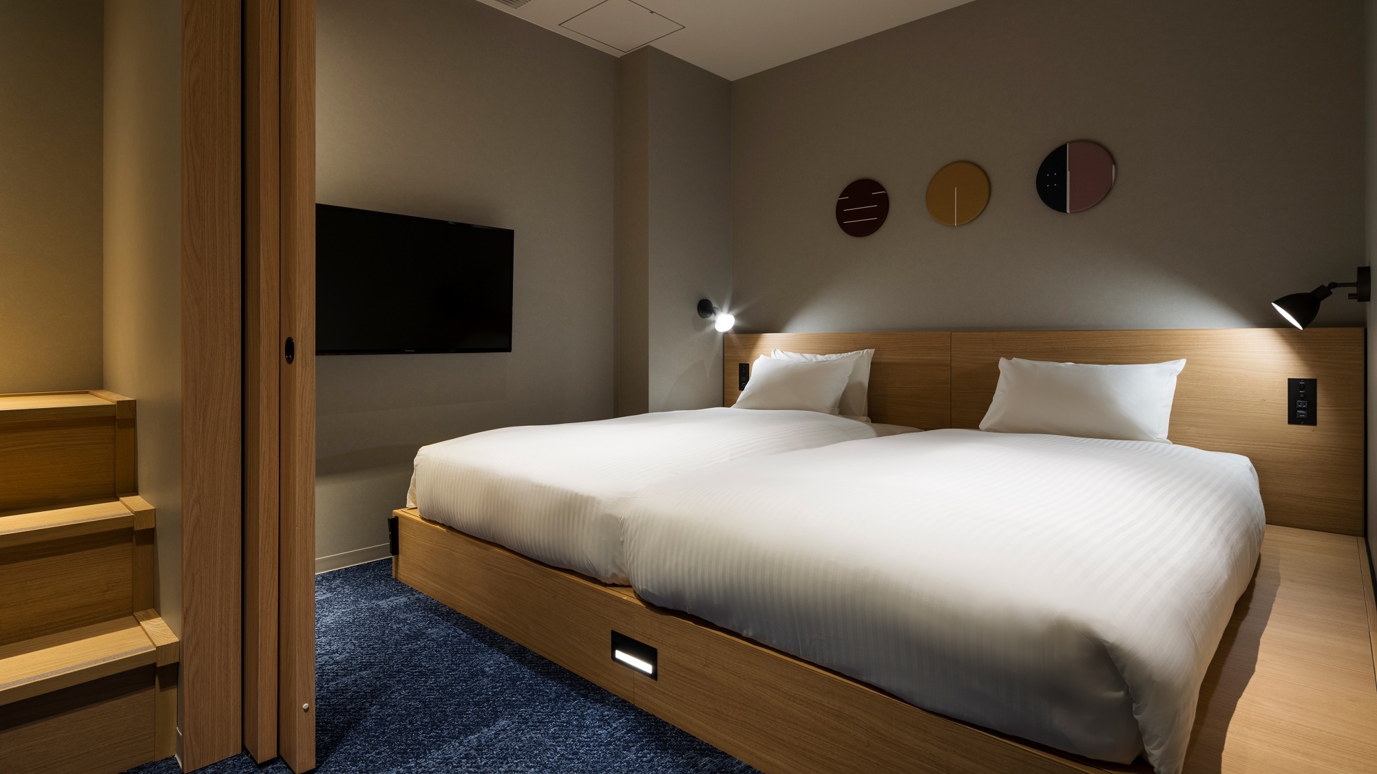 バンクベッドルーム｜シングルベッド2台と2段ベッド1台を備え、最大4名様まで宿泊可能です。