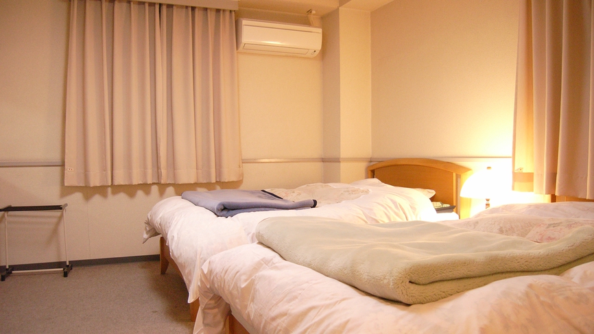*【部屋】和洋室一例でございます。ぐっすり眠っていただけるように、お布団は羽毛布団を使用しています。
