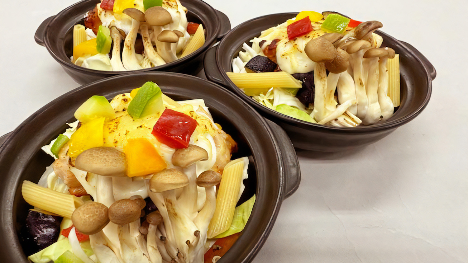 ②『きのこ』と若鶏ローストと浅利と茄子の胡麻醤油オイル蒸し焼き