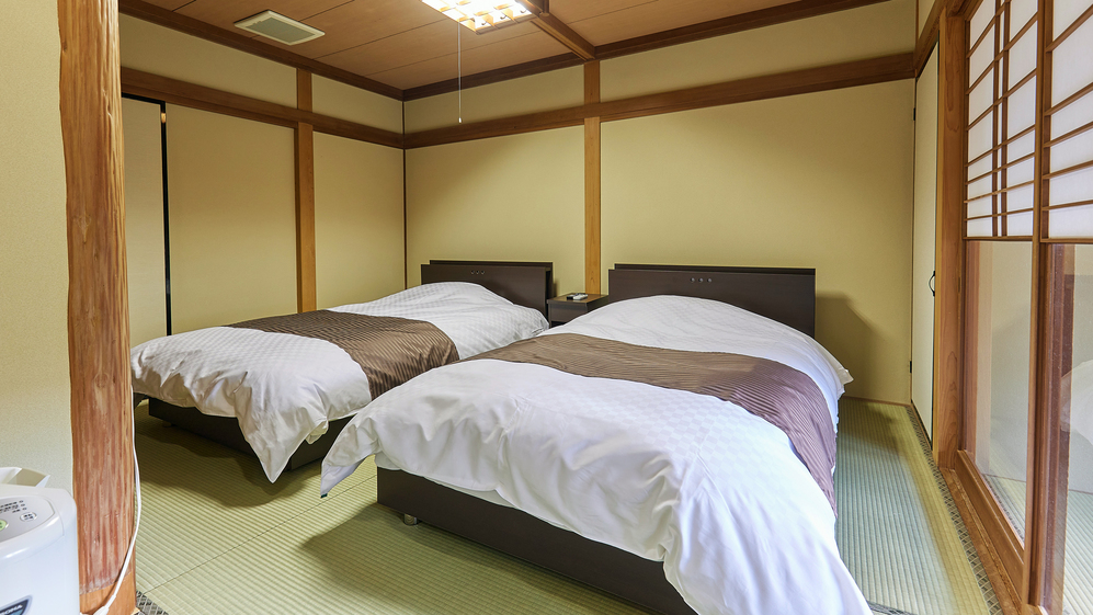 6畳＋6畳の客室ベッドルーム