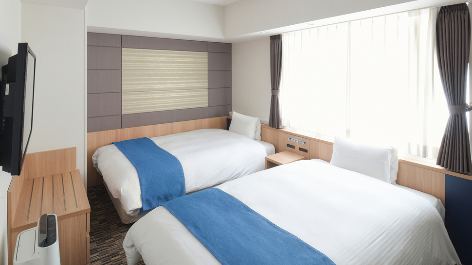 ツインルーム：19〜23平米幅120cmサイズのベッド2台設置最大利用4名