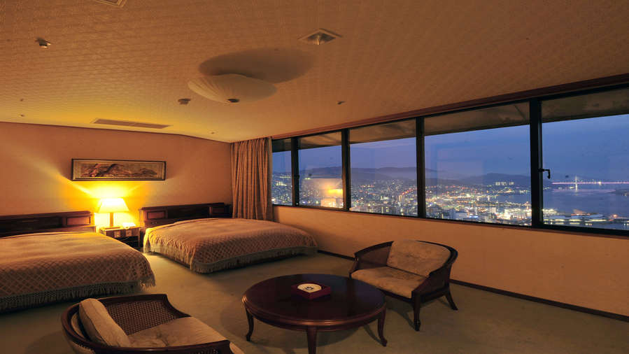 全室より1000万ドルの夜景をご覧いただけます（写真は和洋室の様子）