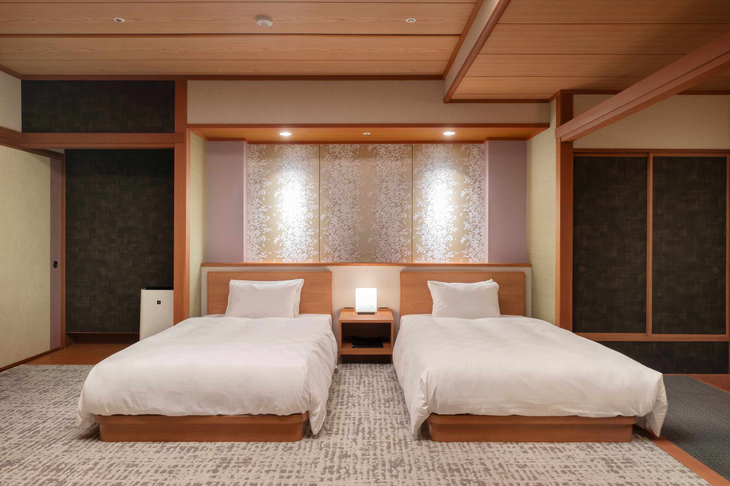 華陽棟 リニューアル標準客室 和風ツインベッド(ベッドエリア一例)