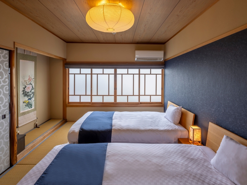 京唐紙の紋様が美しい２階寝室シモンズ製のマットレスでゆったり