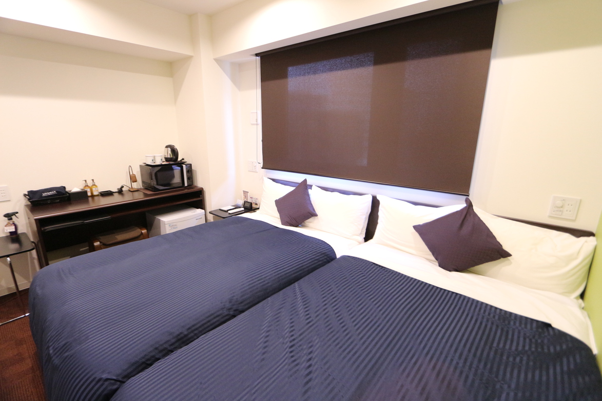 Kamar dengan Ranjang Twin