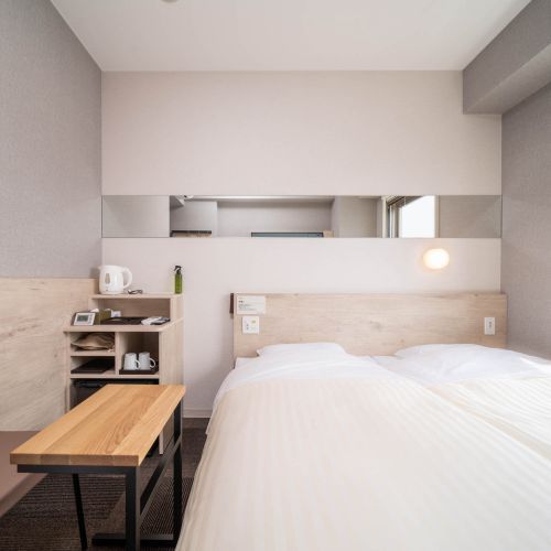 【コンパクトツイン】900×;2000のベッドが2台横並びのお部屋です。