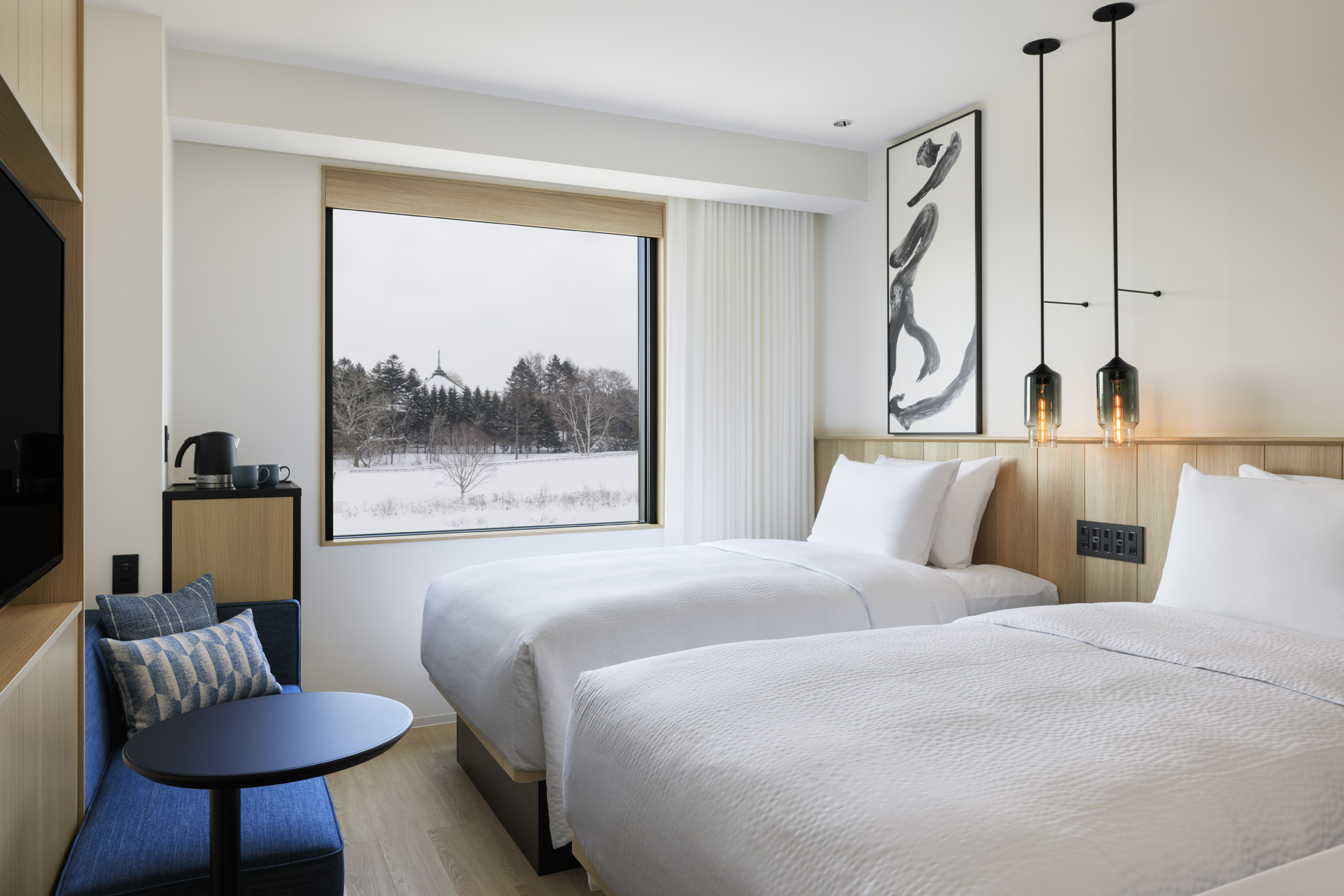 ツインルーム雪景色：21平米禁煙・ベッド幅120cmシンプルながら温かみのある空間でお寛ぎください。