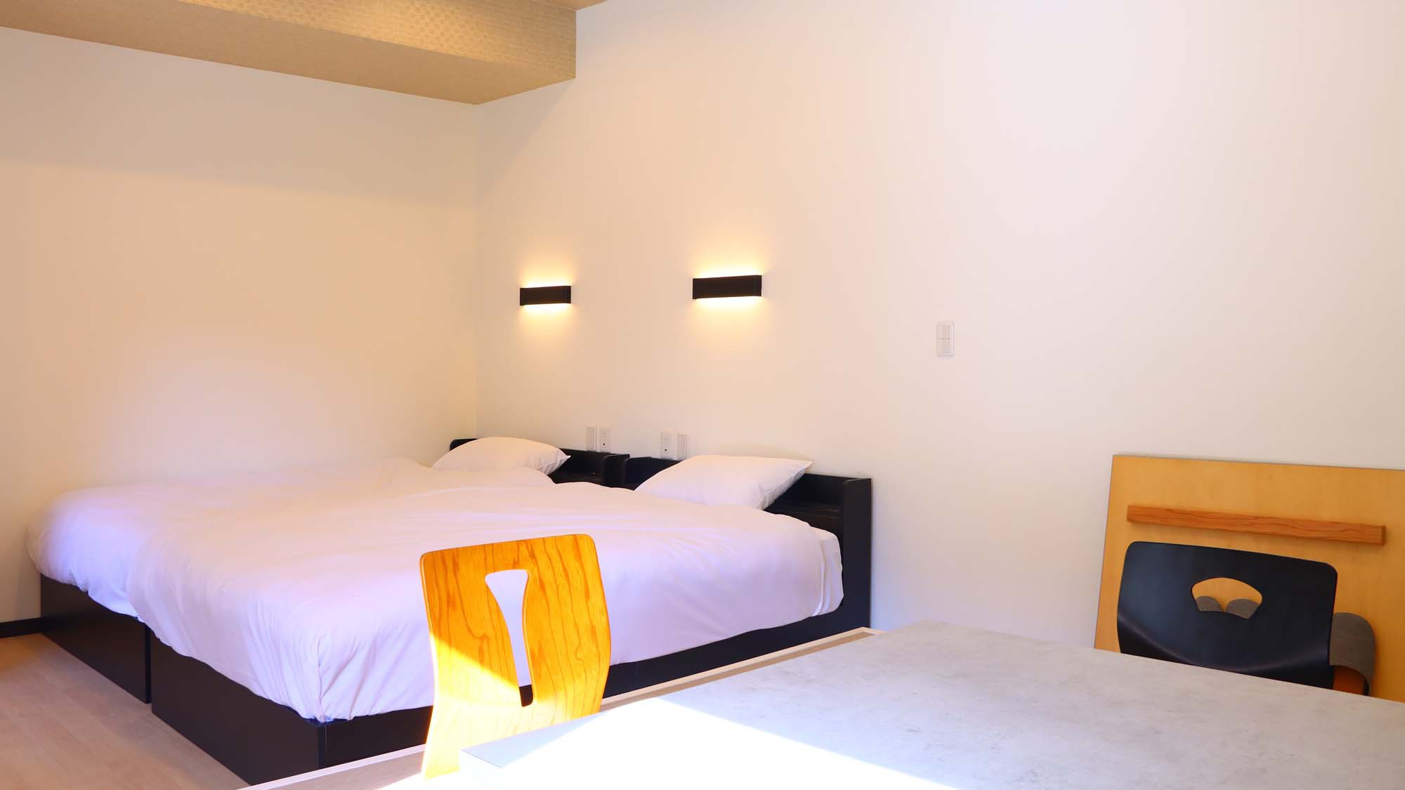 ツインベッドの和洋室