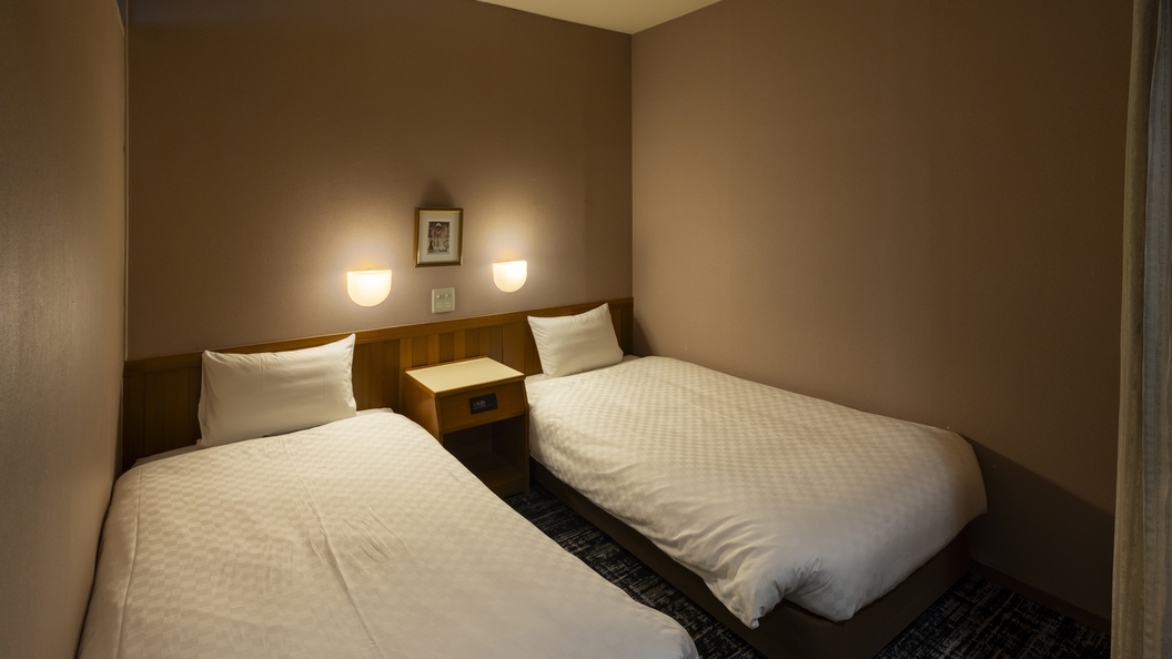 上層階客室和洋室ベッド