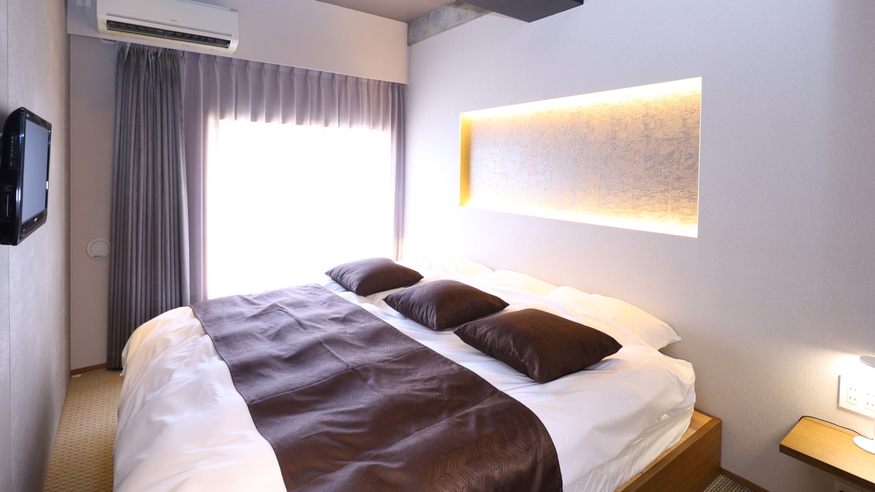 美峰最上階特別室ベッドルーム