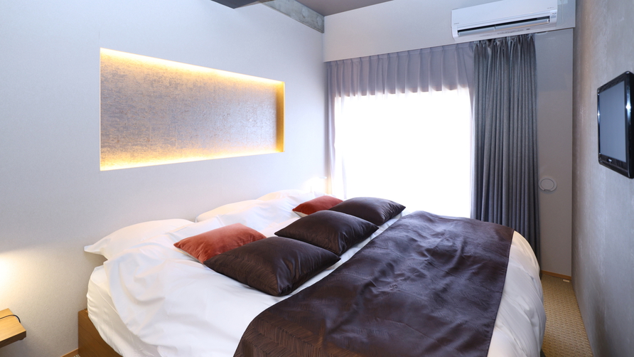 美峰最上階特別室ベッドルーム