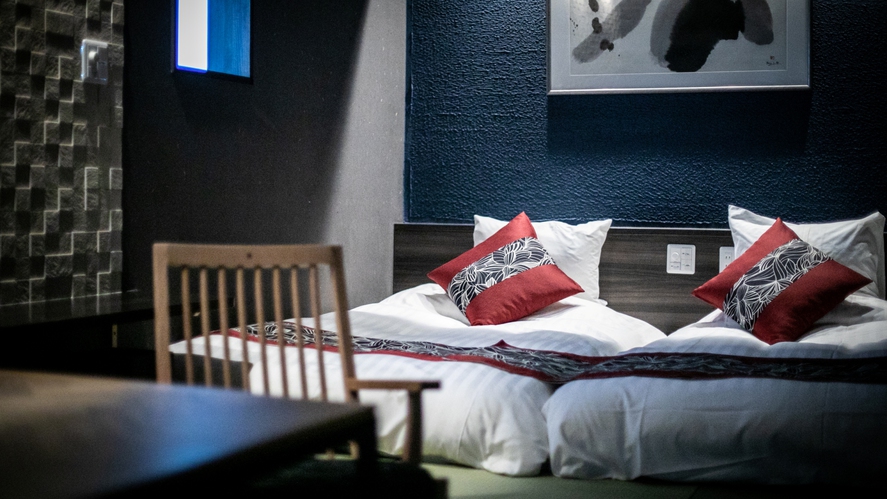 スイート和洋室【山吹】ベッドはシモンズ製を採用しております。