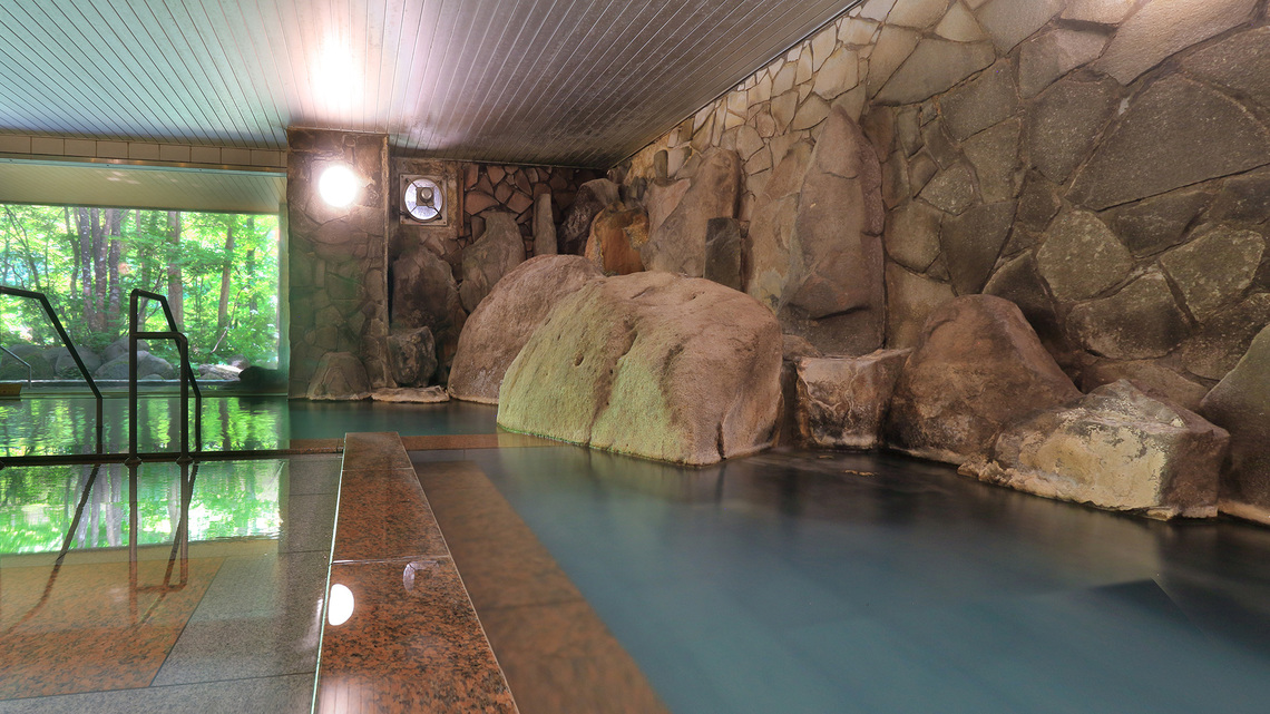 【大自然の湯「川の囁き」】岩をテーマとした大浴場で温泉を堪能