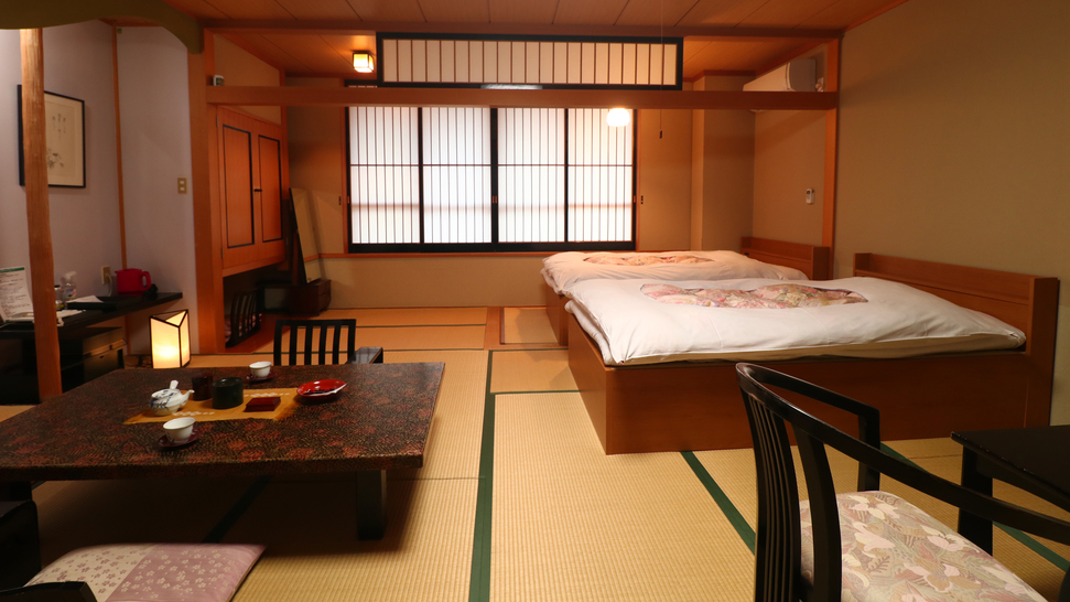 #客室一例ベッド付12.5畳(B・T付)ツインベッドのお部屋。ゆったりとお過ごしいただけます。