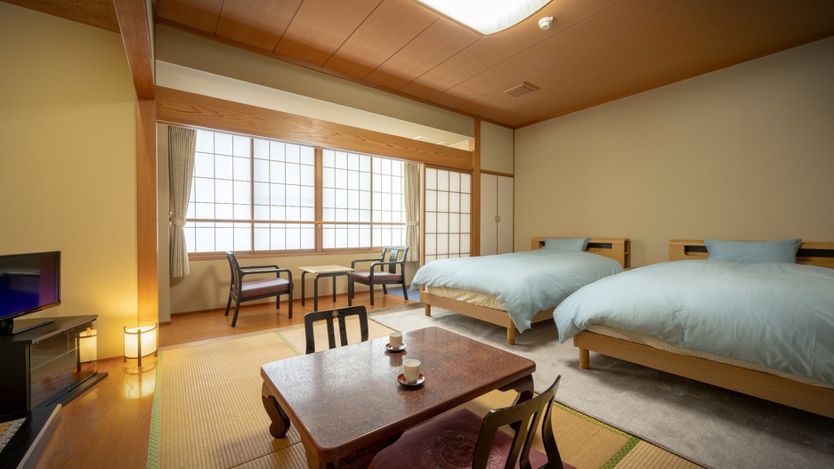 *【ツインベッド/和室10畳（セミダブル）一例】寝起きが楽々なベッドタイプのお部屋です。