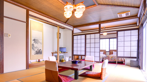 *客室一例（和洋室）／お部屋は宿任せですが全室バストイレ付きです。