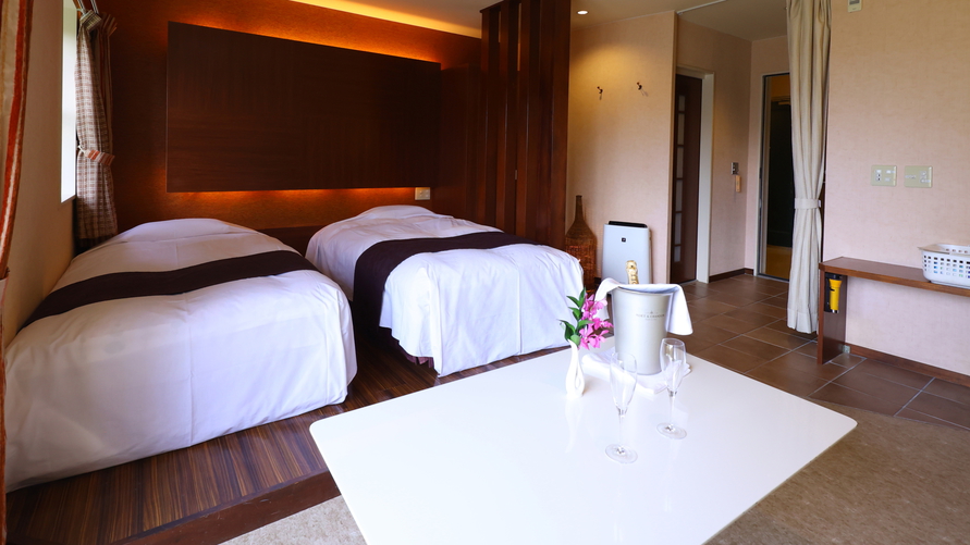 デラックス・ツイン小さなバルコニー付きのお部屋