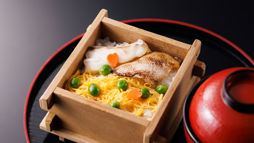 春のお料理イメージ一例五目蒸篭飯のど黒と鯛