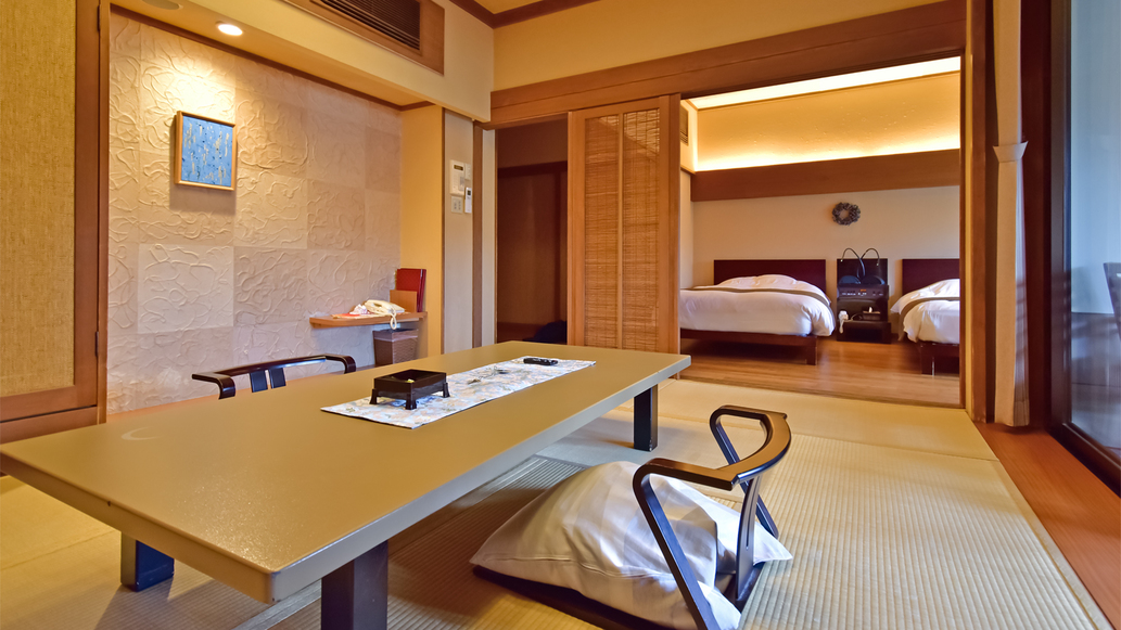 ［とき-TOKI-］ツインベッドを配した半露天風呂付き客室。